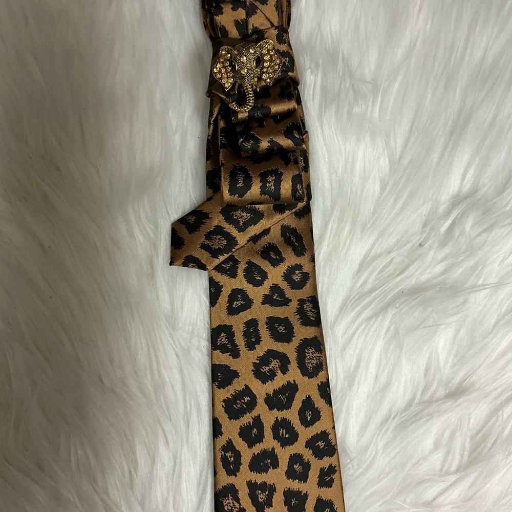 Leopard Print Tie with Elephant Brooch